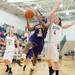 Ypsilanti's Jasmine Jones jumps to make a shot against Dexter's Makenzie Svihra during their game, Friday Jan. 11.
Courtney Sacco I AnnArbor.com 